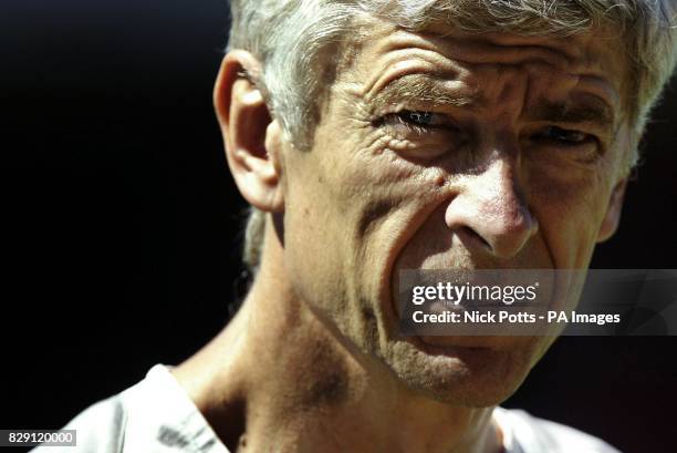 Arsenal Manager Arsene Wenger raises an eyebrow during training at Highbury prior to Sunday's FA Community Shield against Manchester United. Arsenal...