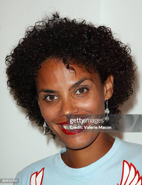 Evelyn Jean-Louis, Jimmy Jean-Louis' wife, attends the opening of Jeffery Dread's Exhibit "Human Footprint : The Impact" hosted by Trigg Ison Fine...