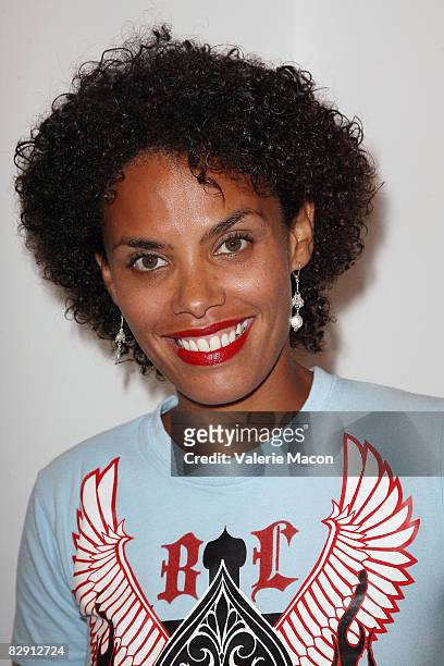 Evelyn Jean-Louis, Jimmy Jean-Louis' wife, attends the opening of Jeffery Dread's Exhibit "Human Footprint : The Impact" hosted by Trigg Ison Fine...