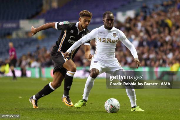 Rekeil Pyke of Port Vale and Vurnon Anita of Leeds United during the Carabao Cup First Round match between Leeds United and Port Vale at Elland Road...