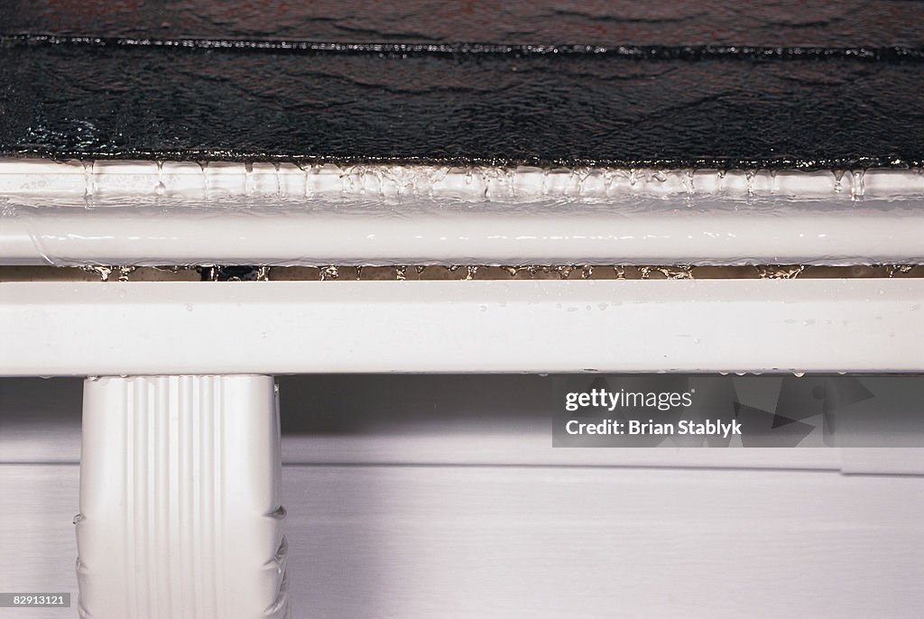 Rain Flowing Into Rain Gutter