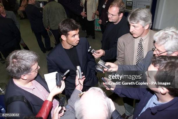 Australian rugby league scrum half Andrew Johns is greeted by the media at Manchester Airport, as the touring Australian team arrive in Britain for a...