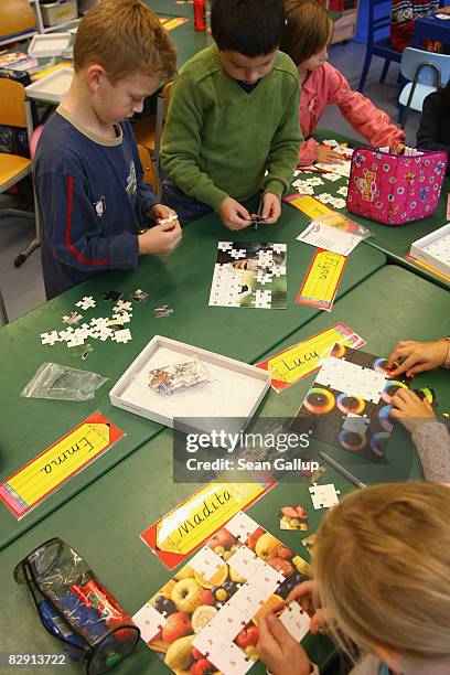 Second-grade children attend class in the elementary school at the John F. Kennedy Schule dual-language public school on September 18, 2008 in...