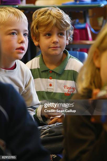 Second-grade children attend class in the elementary school at the John F. Kennedy Schule dual-language public school on September 18, 2008 in...