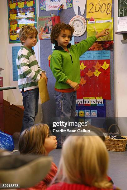 Second-grade children attend class in the elementary school at the John F. Kennedy Schule dual-language public school on September 18, 2008 in...