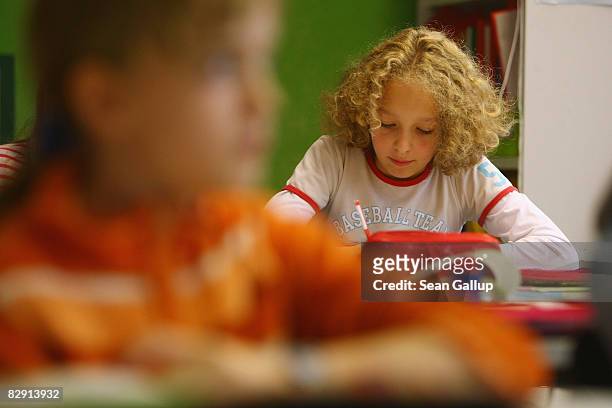 Fourth-grade children attend class in the elementary school at the John F. Kennedy Schule dual-language public school on September 18, 2008 in...