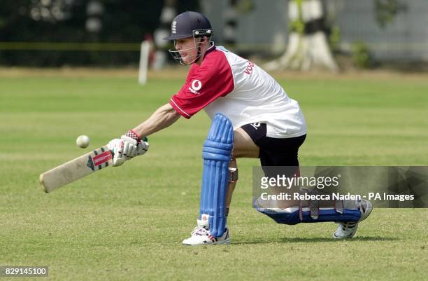 England batsman Nick Knight practises reverse sweeping at the Kolkata Cricket and Football Club, Kolkata , India.