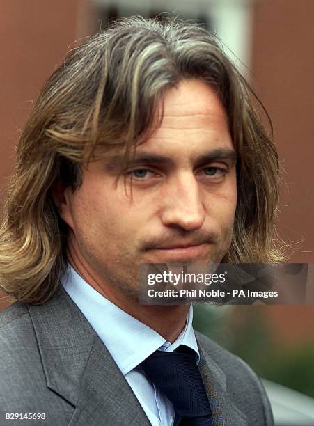 Aston Villa midfielder David Ginola leaves an FA disciplinary hearing in Manchester, where he received a two match ban and a 20,000 fine after being...