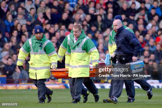 West Ham United's Don Hutchinson is stretchered off during during their FA Barclaycard Premiership match against visitors Middlesbougfh, at Upton...