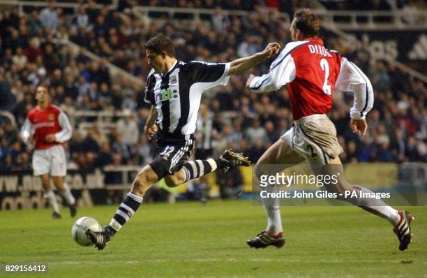 Newcastle's Laurent Robert scores to level the score for Newcastle United against Arsenal during their AXA sponsored FA Cup quarter-final match at St...