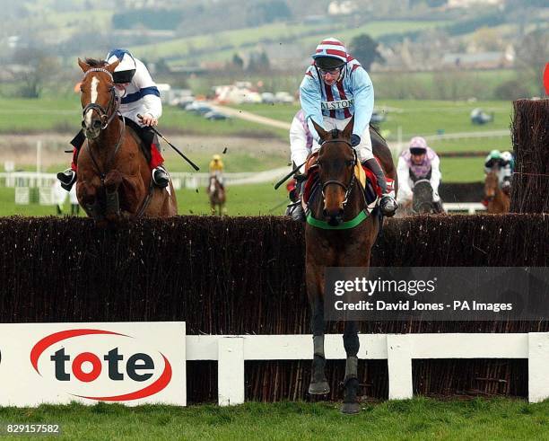 Jim Culloty on Best Mate leads over the last fence ahead of second-placed Comanche Court to win the Cheltenham Gold Cup.