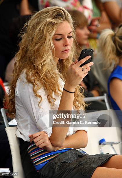 Tamsin Egerton watches the Osman Yousefzada show at London Fashion Week Spring/Summer 2009 on September 19, 2008 in London, England.