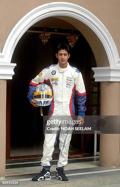 Aspiring Indian motor racing driver Akhil Khushlani poses at his home in Hyderabad on June 11, 2007. The seventeen year old has been awarded a...