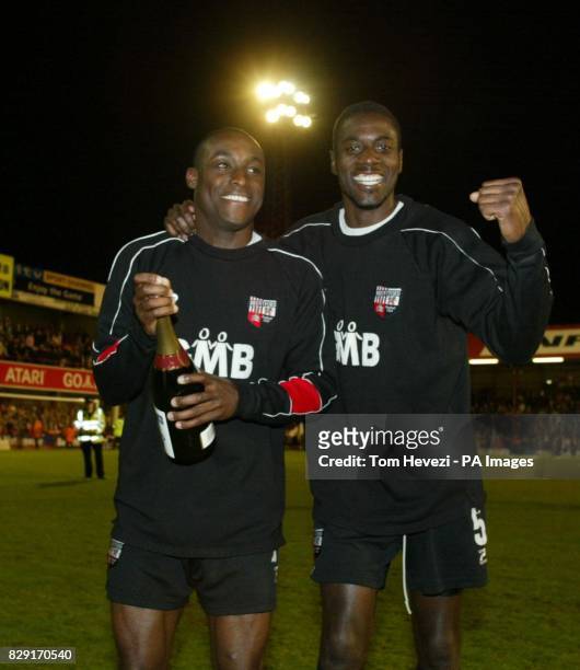 Brentford's goal scorers Lloyd Owusu and Darren Powell celebrate after beating Huddersfield 2-1 and winning a place in the final, after Nationwide...