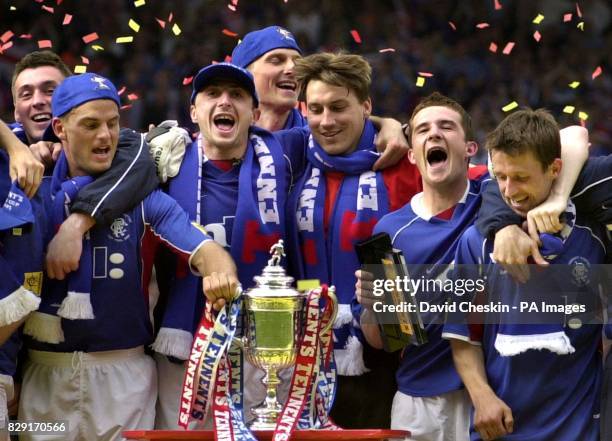 Ranger's Allan McGregor, Ronald de Boer, Shota Arveladze, Tore Andre Flo, Stefan Klos, Barry Ferguson, Neil McCann celebrate winning the Tennent's...