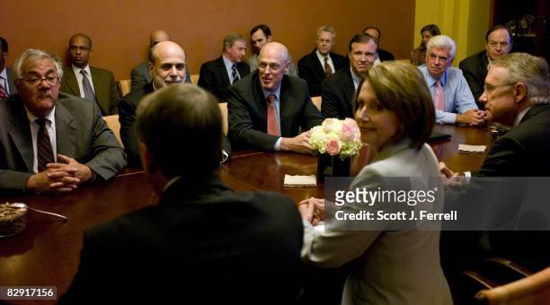Sept. 18: Federal Reserve Chairman Ben S. Bernanke, Treasury Secretary Henry M. Paulson, and SEC Commissioner Christopher Cox, seated in background...