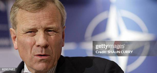 Nato Secretary-General Jaap de Hoop Scheffer adddresses a press conference in central London, on September 19, 2008. NATO ministers grappled Friday...