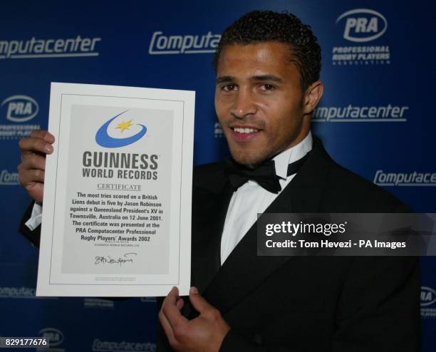 Sale Rugby Union Football Club wing Jason Robinson with the Guinness World Record Certificate for the most tries scored on a British Lions debut -...