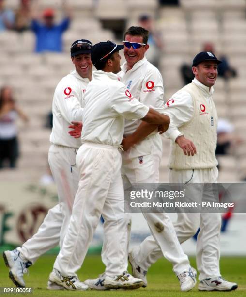 England's Ashley Giles celebrates taking the wicket of Sri Lanka's Hashan Tillakaratne, during the Third Test at Old Trafford, Manchester.