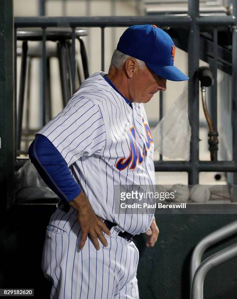 Manager Terry Collins of the New York Mets reacts in the dugout in the ninth inning of an MLB baseball game with his team losing to the Los Angeles...