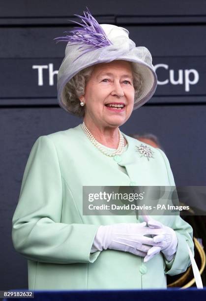 Queen Elizabeth II HRH prepares to present the Gold Cup at Royal Ascot. 14/11/02 : The Queen was opening a 35 million university library - believed...