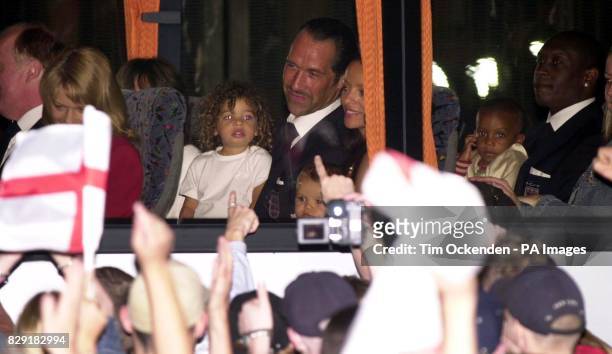 England's goalkeeper David Seaman with daughter Georgina depart onboard the team coach, at Heathrow Airport, London. The England team have arrived...