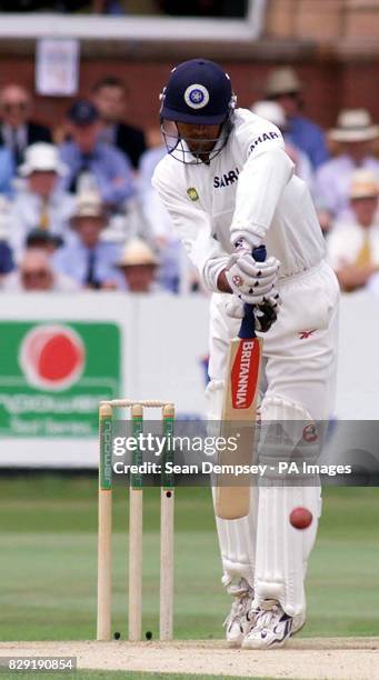 Indian batsman Rahul Dravid plays a back foot defensive stroke off the bowling of England bowler Andrew Flintoff during the third day of the first...