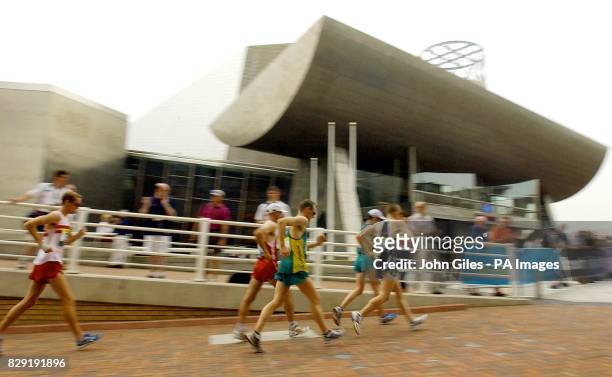Competitors in the Men's 50 Kilometre Walk pass the Lowry Gallery in Salford Keys, Manchester during the Commonwealth Games.