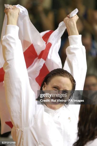 England's Karen Pickering celebrates after winning gold in the Women's 200m freestyle at the Manchester Aquatic Centre, Manchester.