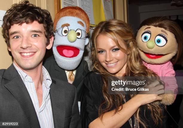 Actors Michael Urie and Becki Newton pose backstage puppets "Rod" the gay republican and "Kate Monster" at "Avenue Q" on Broadway on September 18,...