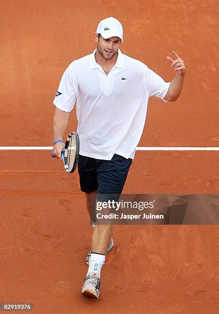 Andy Roddick of the United States reacts during day one of his semi final Davis Cup match against David Ferrer of Spain at the Plaza de Toros Las...