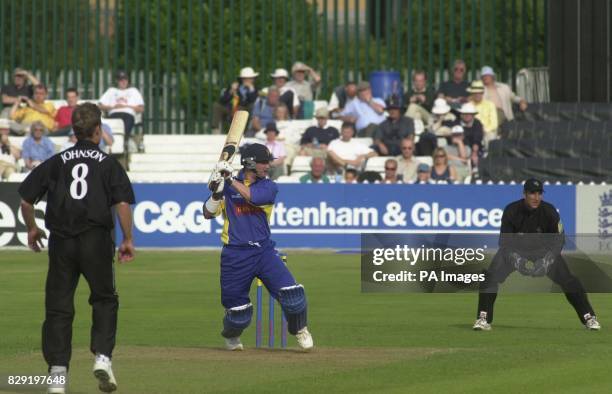 Derbyshire's Michael Di Venuto cuts a delivery from Hampshire's Johnson for four during his innings of 37, during the Norwich Union League Division...