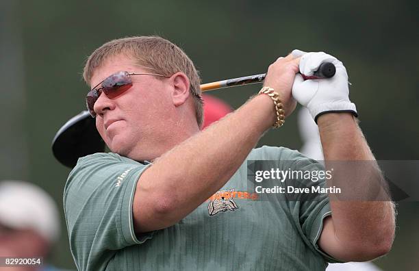 John Daly watches his drive from the 10th tee during second round play in the Viking Classic at the Annandale Golf Club on September 19, 2008 in...