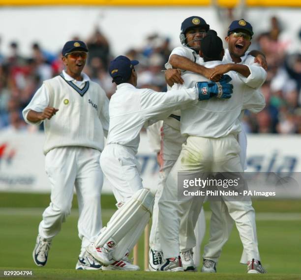 Indian fielders run to congratulate Harbajahn Singh after he dismissed Andrew Flintoff for Zero during the third day of the third nPower test match...