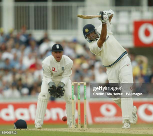 India's Rahul Dravid hits a ball from England's Ashley Giles during the fourth day of the fourth and final nPower Test Match at the Oval, London.