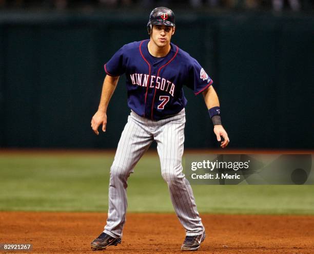 Catcher Joe Mauer of the Minnesota Twins leads off first against the Tampa Bay Rays during the game on September 18, 2008 at Tropicana Field in St....