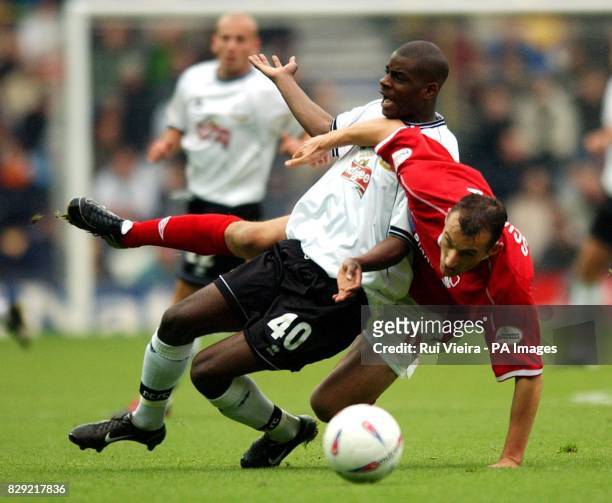 Derby's Izale McLeod and Forest's Riccardo Scimeca during the Nationwide Division One match between Derby County v Nottingham Forest at Pride Park....