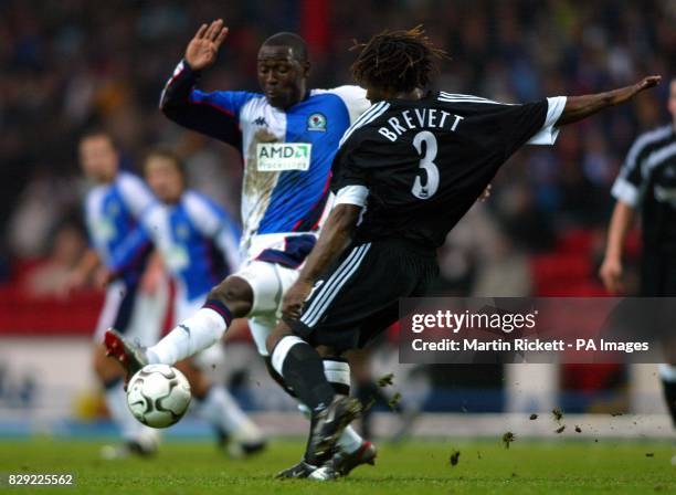 Blackburn Rovers' Andy Cole challenges Rufus Brevett of Fulham, during their FA Barclaycard Premiership match at Blackburn's Ewood Park. Final score:...