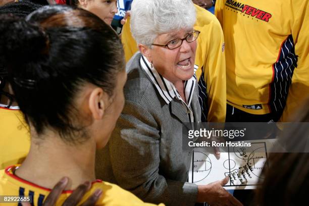 Head Coach of the Indiana Fever, Lin Dunn, speaks with her team prior to the Fever taking on the Detroit Shock in Game One of the Eastern Conference...