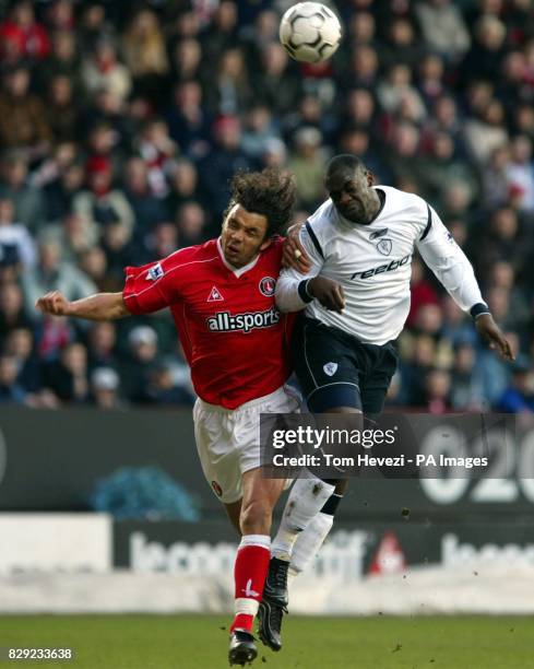 Charlton's Mark Fish and Bolton's Michael Ricketts make contact, during their Barclaycard Premiership match at The Valley. THIS PICTURE CAN ONLY BE...