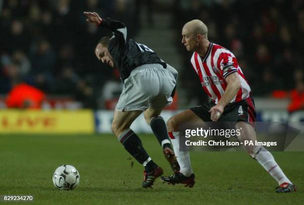 Chris Marsden of Southampton in action against Danny Murphy of Liverpool, during their Barclaycard Premiership match at the St Mary's ground. THIS...