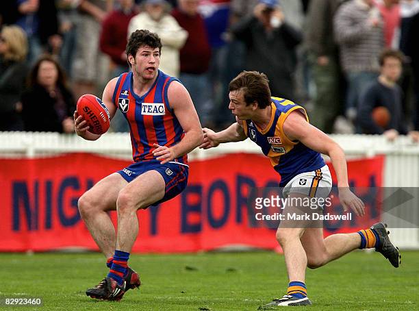 Toby Pinwill of Port Melbourne evades Liam Picken of Williamstown during the VFL 2nd Preliminary Final between Port Melbourne and Williamstown at...