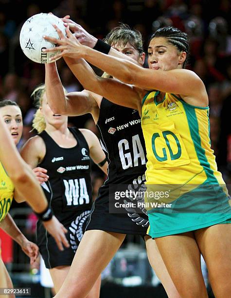 Irene Van Dyk of the Silver Ferns competes for the ball with Mo'onia Gerrard of the Diamonds during game two of the New World Series match between...