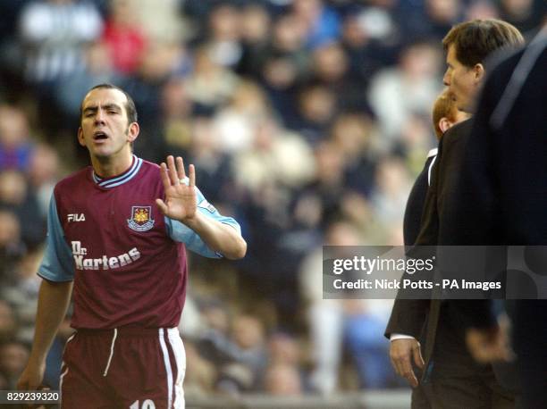 West Ham United's Paolo Di Canio is unhappy with Manager Glenn Roeader as he taken off early in the second half against West Bromwich Albion, during...