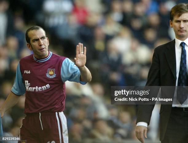 West Ham United's Paolo Di Canio is unhappy with Manager Glenn Roeader as he taken off early in the second half against West Bromwich Albion, during...