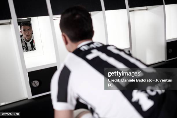 Paulo Dybala poses with his new Juventus shirt on August 10, 2017 in Turin, Italy.