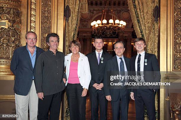 Antoine Baduel , head of the FG Dj radio and French musician Martin Solveig pose with France's Minister for Culture and Communication Christine...