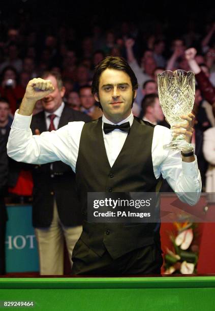 England's Ronnie O'Sullivan with his crystal trophy after beating Scotland's John Higgins by 10 - 9 in frames in the final of the Irish Masters...