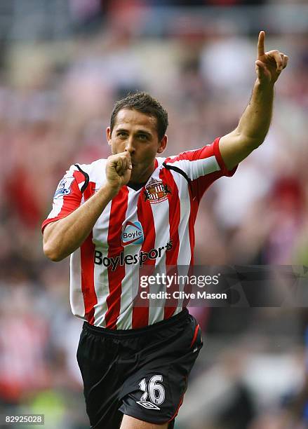 Michael Chopra of Sunderland celebrates his first goal during the Barclays Premier League match between Sunderland and Middlesbrough at the Stadium...