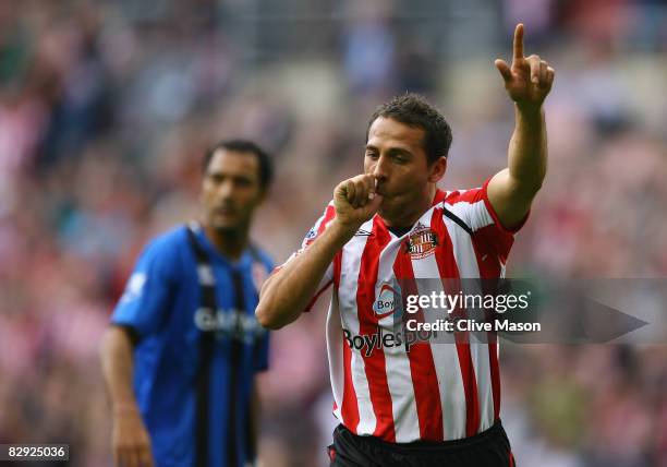 Michael Chopra of Sunderland celebrates his first goal during the Barclays Premier League match between Sunderland and Middlesbrough at the Stadium...